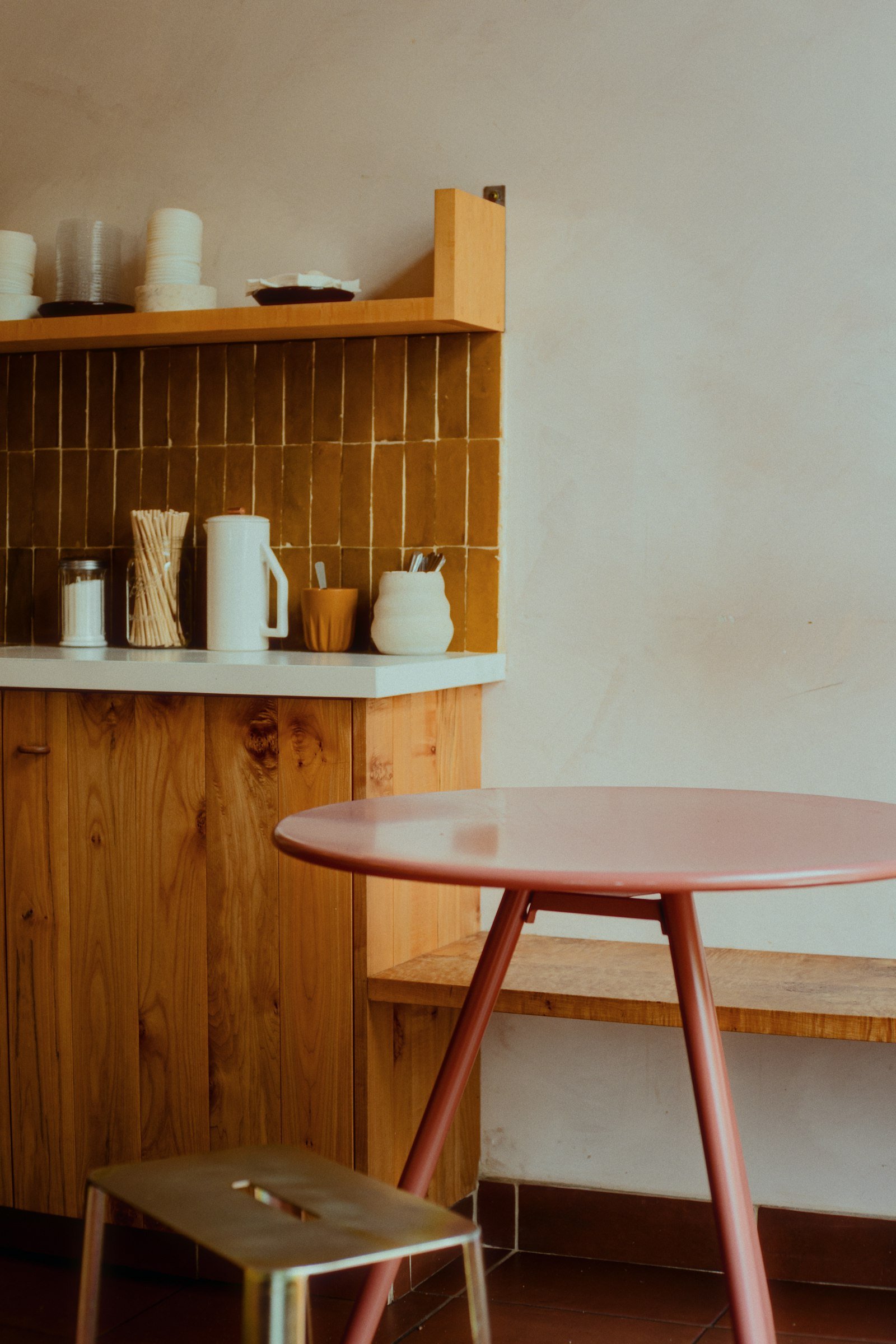 Cosy kitchen setup featuring a soft pink table